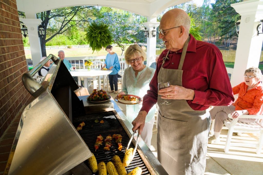 Senior Man Grilling