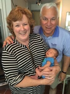 Frank and Jeannie with a grandchild