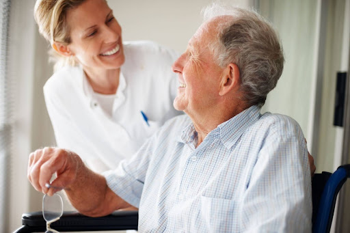 doctor smiling at senior man