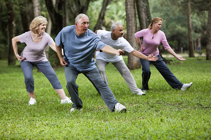 Seniors Doing Tai Chi in Park