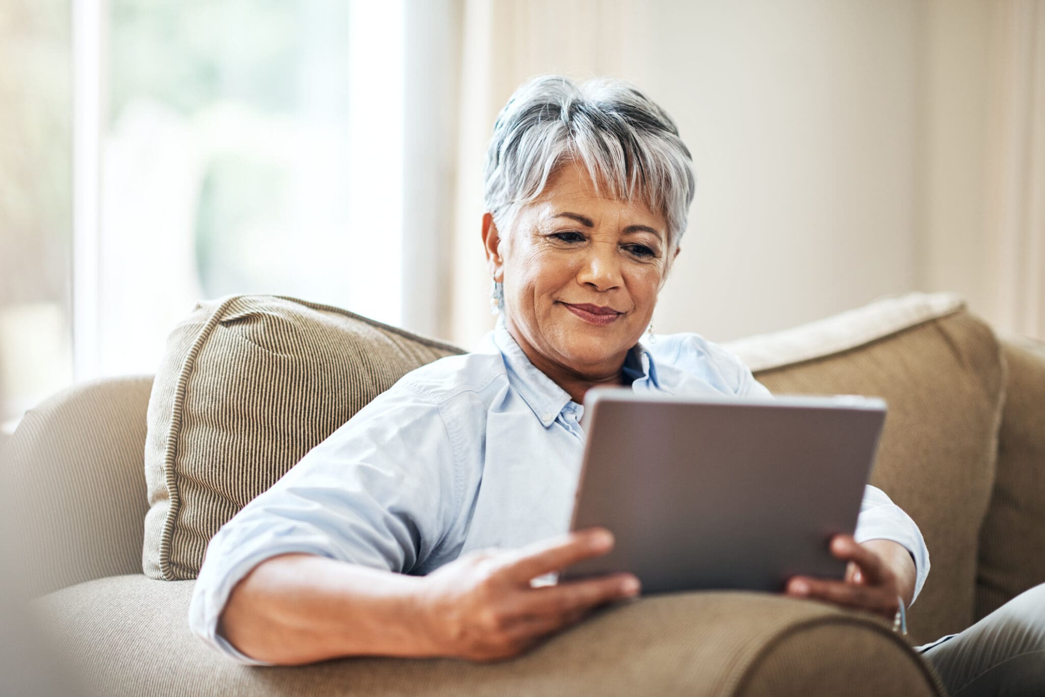 senior woman use tablet