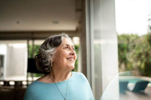 Senior Woman Smiling In Distance